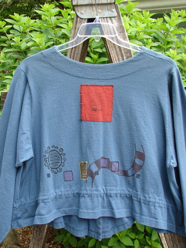 1997 Treehouse Jacket Path Less Traveled Blueprint Size 2, features a unique double-paneled V-neck, button line with four original buttons, a drawcord flounce front tie, and varying hemline.