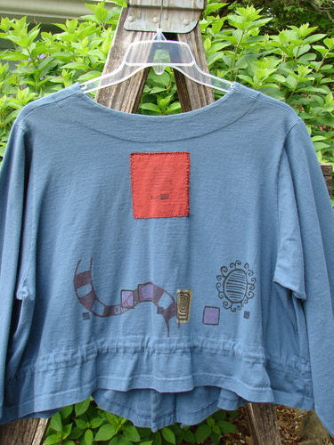 1997 Treehouse Jacket Path Less Traveled Blueprint Size 2, features a unique double-paneled V-neck, button line with four original buttons, a drawcord flounce front tie, and varying hemline.