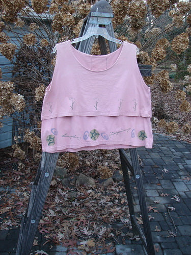 1993 Parallel Top Twig Ash Pink OSFA: A pink shirt on a wooden ladder with a close-up of a metal post. A vintage summer collection piece with a crop A-line cut and double-layered bodice. Perfect condition.