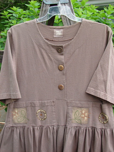 1999 Garden Herb Dress Riverbed Floral Altered Size 1 features a flirty hemline, drop waist with four-paneled pockets, ceramic top button, and slimmer lower flounce, ideal for vintage Blue Fish Clothing enthusiasts.