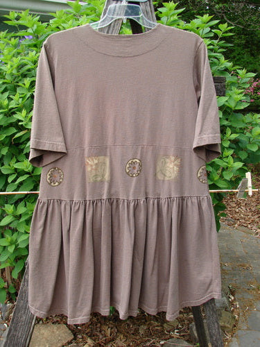 1999 Garden Herb Dress Riverbed Floral Altered Size 1 features a flirty hemline, drop waist with four-paneled pocket, ceramic top button, and a folded flair skirt from BlueFishFinder's vintage collection.