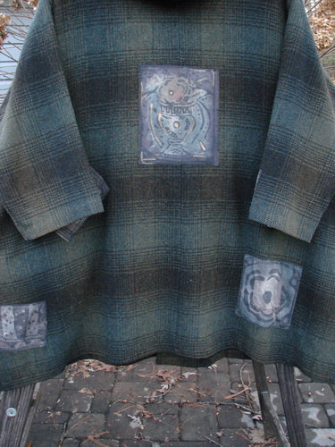 Image alt text: 1995 Patched Hooded Autumn Jacket in Cottage Green Plaid, featuring oversized vintage buttons, A-line shape, and cozy double-lined hood.