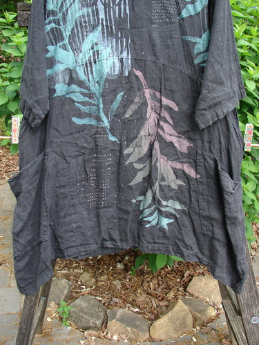 Barclay Linen Two Pocket Urchin Dress Falling Branch Black Size 1 features a rounded neckline, sectional panels, three-quarter sleeves, and double drop front wrap pockets, showcasing the vintage Blue Fish style.