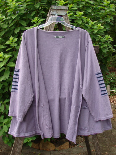 Barclay Sample Open Front Stripe Patch Jacket Rear Celestial Lavender OSFA displayed on a wooden hanger, showcasing its unique open front design and patchwork detailing, embodying the creative spirit of BlueFishFinder.com.