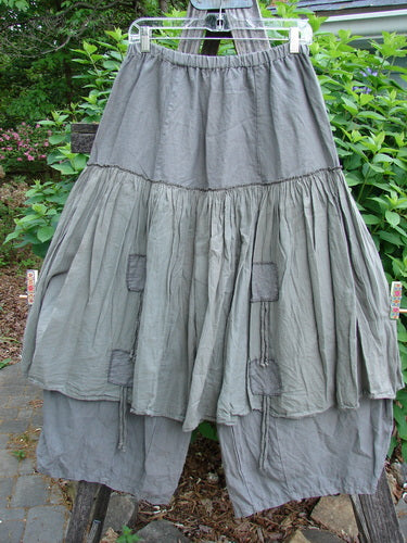 Barclay Linen Batiste Pant Skirt Unpainted Grey Green Size 0 features a unique dual-layer design with elastic waist, double tie accents, and tapered pant, embodying BlueFishFinder's vintage style creativity.