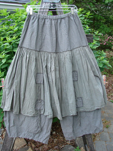 Barclay Linen Batiste Pant Skirt Unpainted Grey Green Size 0 features a unique dual-layer design with elastic waist, double tie accents, and tapered pant, embodying BlueFishFinder's vintage style creativity.