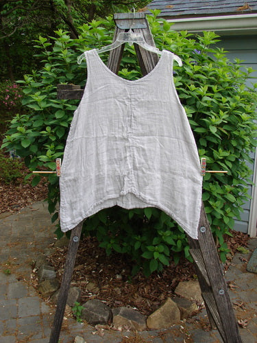 Barclay Linen Atoll Top Floral Blossom Ash Natural Size 0 features a lightweight linen fabric with a scooped neckline, full A-line swing, and signature blossom theme, perfect for expressing individuality.