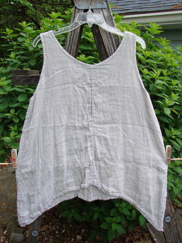 Barclay Linen Atoll Top Floral Blossom Ash Natural Size 0: A lightweight linen top with a full swing silhouette, featuring a scooped neckline and unique blossom theme, ideal for expressing individual style.