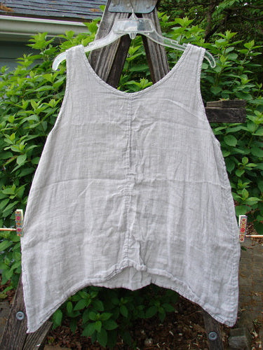 Barclay Linen Atoll Top Floral Blossom Ash Natural Size 0: A lightweight linen top with a full swing silhouette, featuring a scooped neckline and unique blossom theme, ideal for expressing individual style.