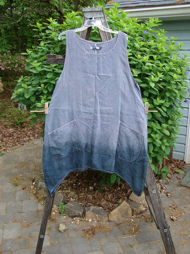 Barclay Linen Contrast Stitch Pocket Pinafore Unpainted Lilac Grey Size 0 features a scoop neckline, A-line shape, contrasting stitching, and round drop pockets, embodying Blue Fish's vintage-inspired creative freedom.