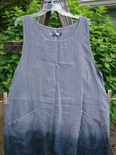 Barclay Linen Contrast Stitch Pocket Pinafore in Unpainted Lilac Grey, Size 0, featuring a scoop neckline, A-line shape, round bottom exterior pockets, and contrast stitching, embodying Bluefishfinder.com's vintage style.