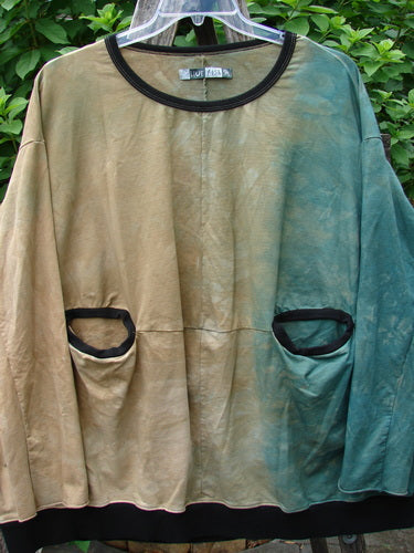 Barclay Cotton Lycra Open Rib Pocket Pullover Mottled Forest Sunset OSFA features a distinct design with visible pockets on a hanger, reflecting Bluefishfinder.com's vintage-inspired, creative expression ethos.