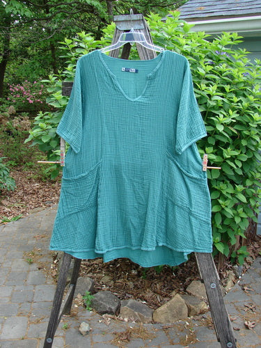 Barclay Gauze Key Pocket Everyday Dress in Unpainted Spearmint Stripe, featuring a unique keyhole neckline, three-quarter sleeves, triangular drop pockets, and drawcord back, showcasing Bluefishfinder's vintage, expressive style.