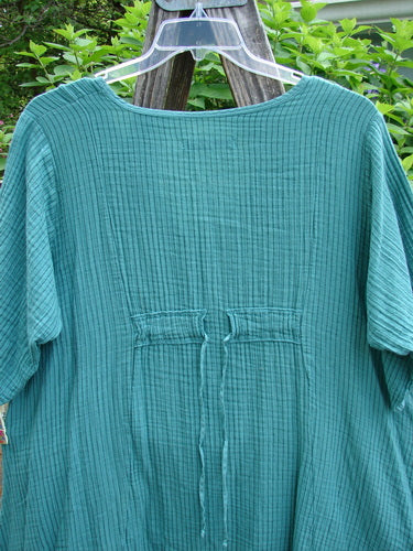 Barclay Gauze Key Pocket Everyday Dress in Spearmint Stripe, featuring a keyhole neckline, A-line shape, three-quarter sleeves, triangular drop pockets, and drawcord back, showcasing Bluefishfinder's creative vintage style.