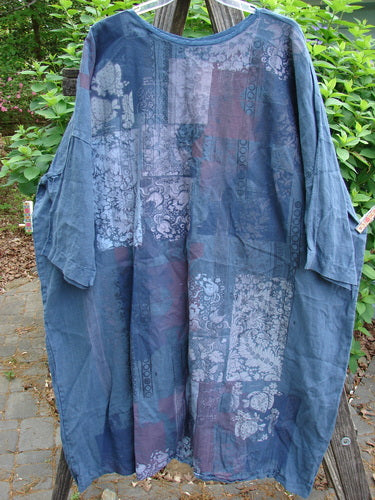 Barclay Linen Oversized Gallery Dress Victorian Echo OSFA, showcasing a rounded neckline, drop shoulders, and three-quarter dolman sleeves. Features a wide, straight, pocketless design with a Victorian-themed print.