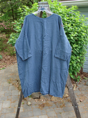 Barclay Linen Oversized Gallery Dress Victorian Echo OSFA features a rounded neckline, drop shoulders, and three-quarter dolman sleeves, with a wide, straight silhouette and Victorian-themed paint, embodying Bluefishfinder's vintage essence.