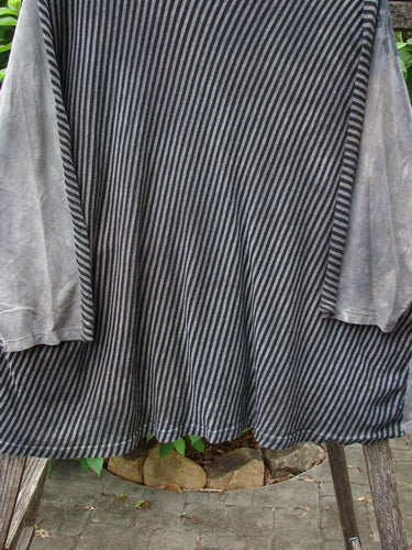 Close-up of the Barclay Modernist High Low Top Fantastic Dream Black Grey Stripe OSFA, showcasing its distinctive black and white striped fabric and unique high-low hem, exemplifying Bluefishfinder.com's vintage elegance.