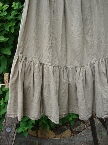 Close-up of the Barclay NWT Batiste Mid Layer Gather Ruffle Skirt Unpainted Dovetail Size 0, showcasing intricate fabric texture and ruffled design, emphasizing artistry and individuality aligned with BlueFishFinder's vintage aesthetic.