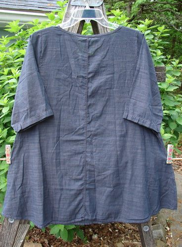 Barclay NWT Chambray Short Sleeved Promotional Top features a dark denim striation, A-line shape, rounded neckline, and Blue Fish Clothing art, perfect for expressing individuality.