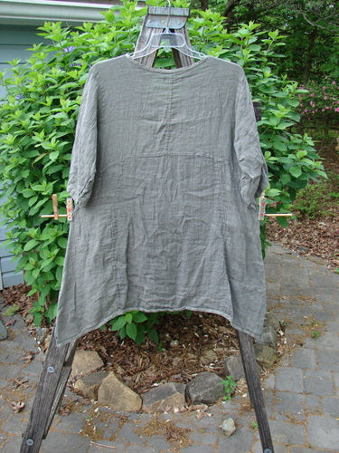 Barclay Linen Two Pocket Urchin Dress Mixed Garden Grey Moss Size 0, showcasing a rounded neckline, empire waist, A-line flair, varying hem, and exterior drop pockets, embodying BlueFishFinder's vintage, expressive style.