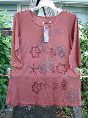 Barclay NWT Slub New Hope Tee Daisy Power Henna Size 1 features three-quarter sleeves, slight hip flare, rounded hem, and dual curved seams, embodying BlueFishFinder's creative and individualistic style.
