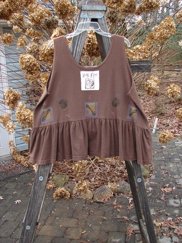 1992 Peplum Top Steaming Soup Mushroom OSFA displayed on a wooden ladder, featuring a white label and signature Star 92 Blue Fish Patch, emphasizing its vintage, baby doll style with a gathered bottom flounce.