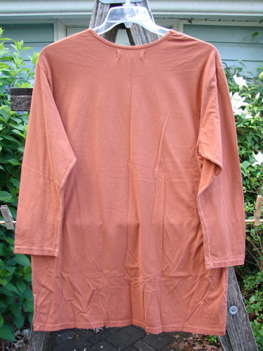 Barclay NWT Long Sleeved Studio Tee Primitive Metallic Ember Size 0, featuring a straight shape, long sleeves, rounded neckline, and holiday-themed metallic paint, crafted from medium-weight organic cotton.
