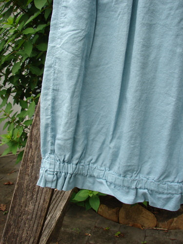 Barclay NWT Batiste Airy Gather Bottom Skirt features delicate pinstripes, showcasing a lightweight, flowing design perfect for expressing individuality. The close-up highlights the skirt's textured fabric, embodying Bluefishfinder.com's vintage aesthetic.