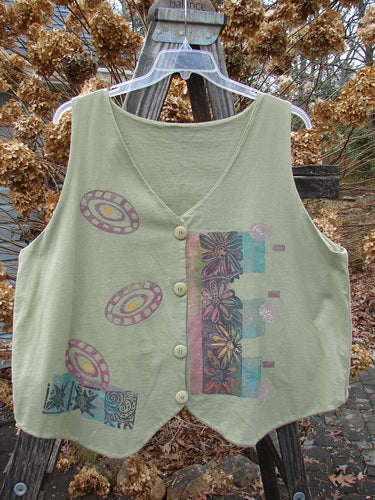 1989 Folk Vest Fish Flower Star Sage OSFA: A green vest with front tuxedo tails, upward scooped back, V-shaped neckline, and vibrant flower star pattern, featuring fabulous matching buttons.