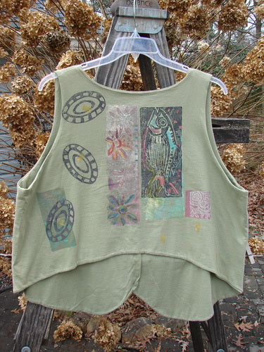 1989 Folk Vest Fish Flower Star Sage OSFA featuring a fish and flower design on a green tank top with front tuxedo tails and a V-shaped neckline.
