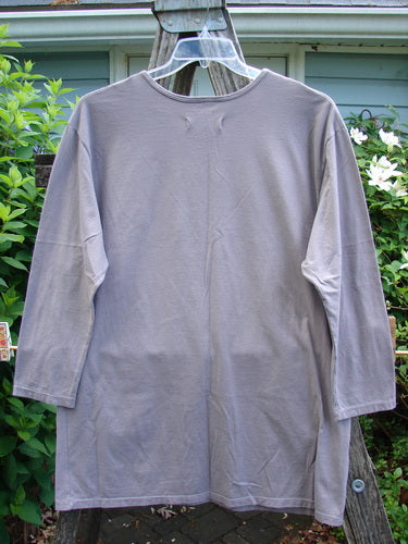 Barclay NWT Long Sleeved Studio Tee features a straight shape, long sleeves, and a rounded neckline with a floral wing theme. Made from medium-weight organic cotton, perfect for expressing individuality.