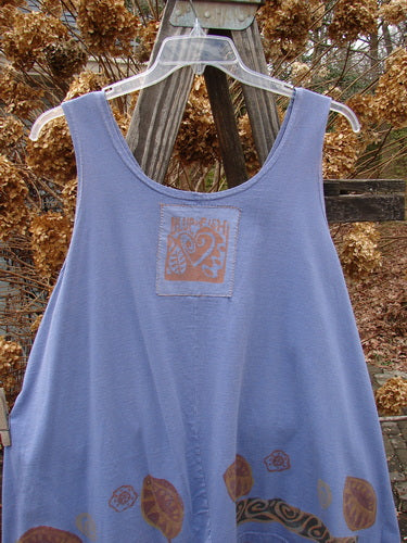 1993 Solo Tank Wonderland Periwinkle OSFA displayed on a hanger, featuring a heart logo, deep arm openings, and an A-line shape, embodying vintage Blue Fish Clothing's creative and individualistic style.