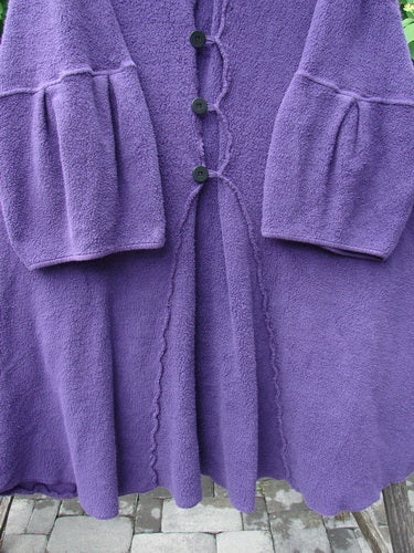 Barclay Patched Celtic Moss Double Snap Button Back Coat Violet OSFA features dark buttons, bell-style sleeves with pleated cuffs, and a gently gathered skirt, exemplifying Bluefishfinder.com's unique vintage style.