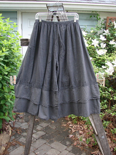 Barclay NWT Gauze Wide Leg Carassai Pant in Stripe Coal Carbon, featuring a full elastic waistline, unique stacked bottom flutters, and extra wide swingy lowers, perfect for creative individual expression.
