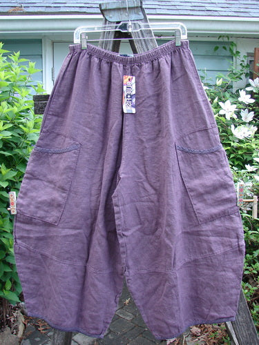 Barclay NWT Linen Stitch Two Pocket Pant in Twilight Plum, features full elastic waist, dual side pockets, and widening lower barrel legs with sectional panels, embodying Bluefishfinder.com's vintage, creative style.