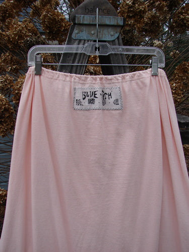 1992 Buttonloop Skirt Breakfast Diner Sea Shell OSFA displayed outdoors on a clothesline, showcasing its drawstring waist, slight bell shape, and buttonholes with hand-dyed silk ribbons.