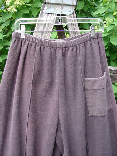 The 2000 Flannel Antoen Pant Unpainted Brum Size 1 features a cozy gray fleece design with an elastic waistband, patch pocket, and professionally replaced cuffs, showcasing vintage warmth and charm.