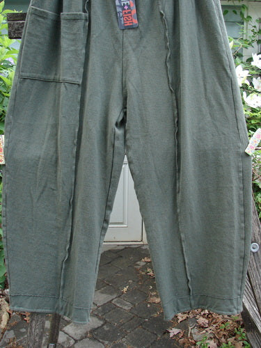 Barclay NWT Rib Single Pocket Exterior Stitch Work Pant in Army features a heavy-weight cotton rib, full elastic waist, singular pocket, wider legs, and vertical stitchery, ideal for fall wear.