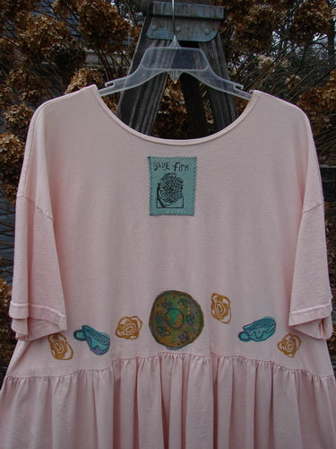 1992 Studio Cardigan Dress Breakfast Diner Sea Shell OSFA adorned with a whimsical breakfast diner theme, featuring a blue patch with a person, and playful neckline accents, embodying vintage Blue Fish charm.