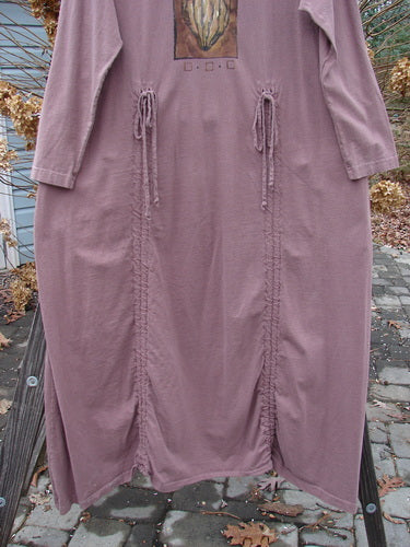 1998 Cornucopia Dress Fall Vegetable Eggplant Size 1 on a pole, featuring long sleeves and vertical drawstrings, showcasing BlueFishFinder's vintage, creative, and expressive design ethos.
