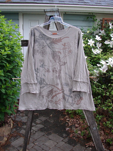 Barclay Petal Sleeved A Line Tunic Floral Dawn Sand Size 1 features a rounded neckline, double petal sleeves, and a generous A-line shape, embodying the store's vintage, expressive style.