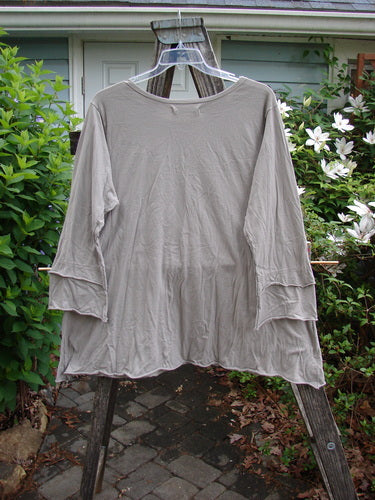 Barclay Petal Sleeved A Line Tunic Floral Dawn Sand Size 1, featuring a rounded neckline, thick double petal sleeves, and a generous A-line shape, exemplifying vintage-inspired elegance from Bluefishfinder.com.