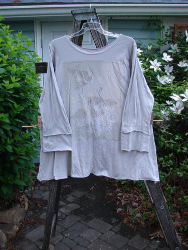 Barclay Cotton Lycra Petal Sleeved A Line Tunic Floral Dawn Flawed Birch Bark Size 1 features a flattering A-line shape with thick double petal sleeves, showcasing blue dye transfer on one sleeve.