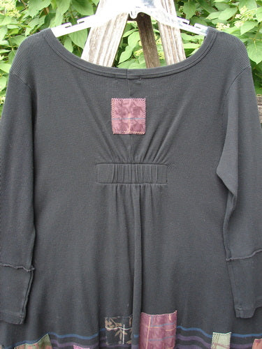 Barclay Patched Thermal Single Button Cardigan Tiny Square Black Size 0, showcasing unique patchwork with a gathered back and earthy hemline detailing, exemplifies Bluefishfinder's vintage-inspired, creative style.