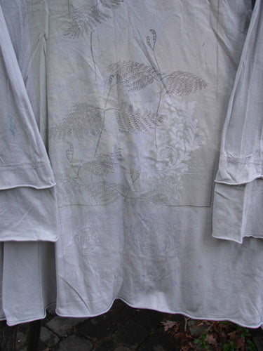 Barclay Cotton Lycra Petal Sleeved A Line Tunic Floral Dawn Flawed Birch Bark Size 1, featuring organic cotton, rounded neckline, double petal sleeves, and blue dye transfer, exemplifying BlueFishFinder's vintage style.