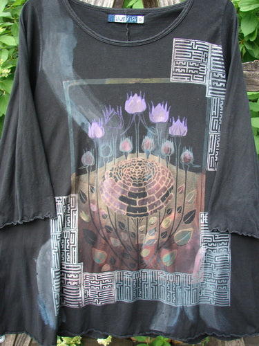 Barclay Three Quarter Sleeved Cafe Tee Floral Bloom Black Size 0 features a large floral graphic with honeycomb and lotus-like blooms, maze-patterned border, and frayed edges, reflecting Bluefishfinder's vintage, expressive style.