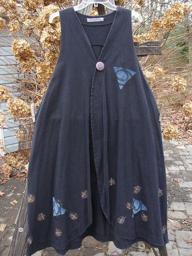 1996 State Fair Vest with blue triangle pattern, oversized button, and double paneled hemline. Organic cotton. Size 1.