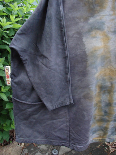 Barclay Cotton Lycra Writer's Pocket Pullover Sweatshirt features a seamless front and back, rounded neckline, narrowing sleeves, square flair, and dual pockets, showcasing a unique dewy garden theme in mottled sunset.