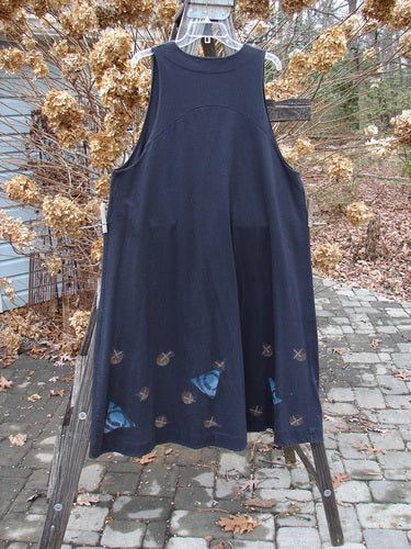 1996 State Fair Vest Tri Moon Storm Size 1 displayed on a rack showcases a single cloth-covered oversized button and a unique double-paneled hemline, highlighting its vintage Blue Fish Clothing charm.