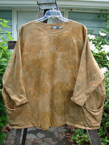 Barclay Cotton Lycra Writer's Pocket Pullover Sweatshirt Floral Mottled Mustard OSFA, featuring a rounded neckline, stretchy sleeves, wide square flair, seamless design, and dual floral-themed pockets, showcasing BlueFishFinder's vintage style.